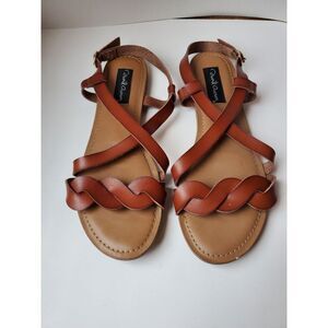 Women's brown‎ crisscross sandals size 9.5 brand is David Aaron